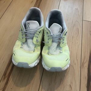 Neon green on clouds size 7 but fits like size 6